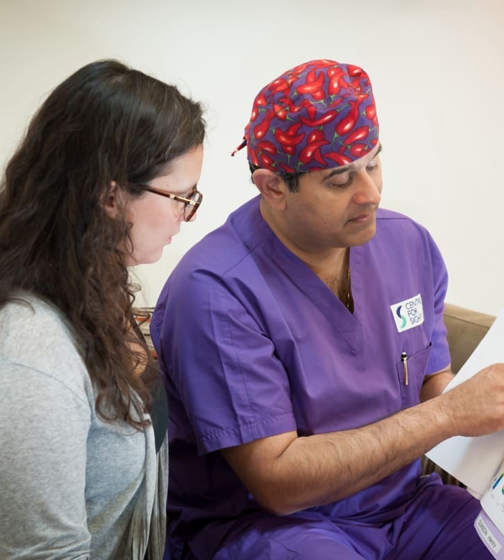 Centre for Sight Medical Director Sheraz Daya and patient at consultation